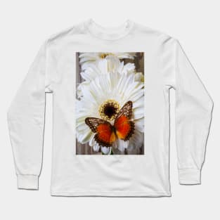 Brown Butterfly Resting On White Daisy Long Sleeve T-Shirt